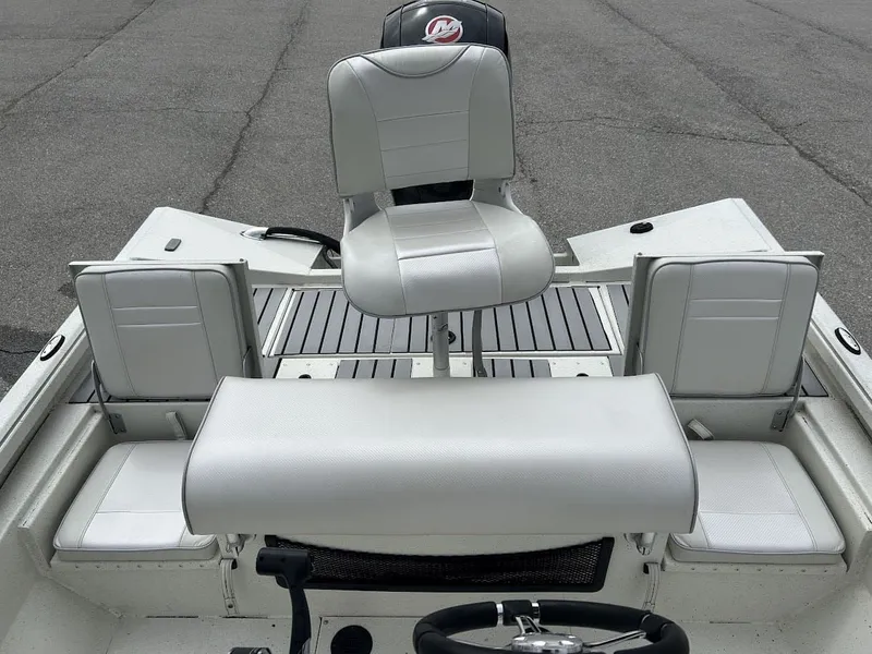 Slide: The Image of Interior of a 2020 Ranger RB200 boat with white seating. - 14