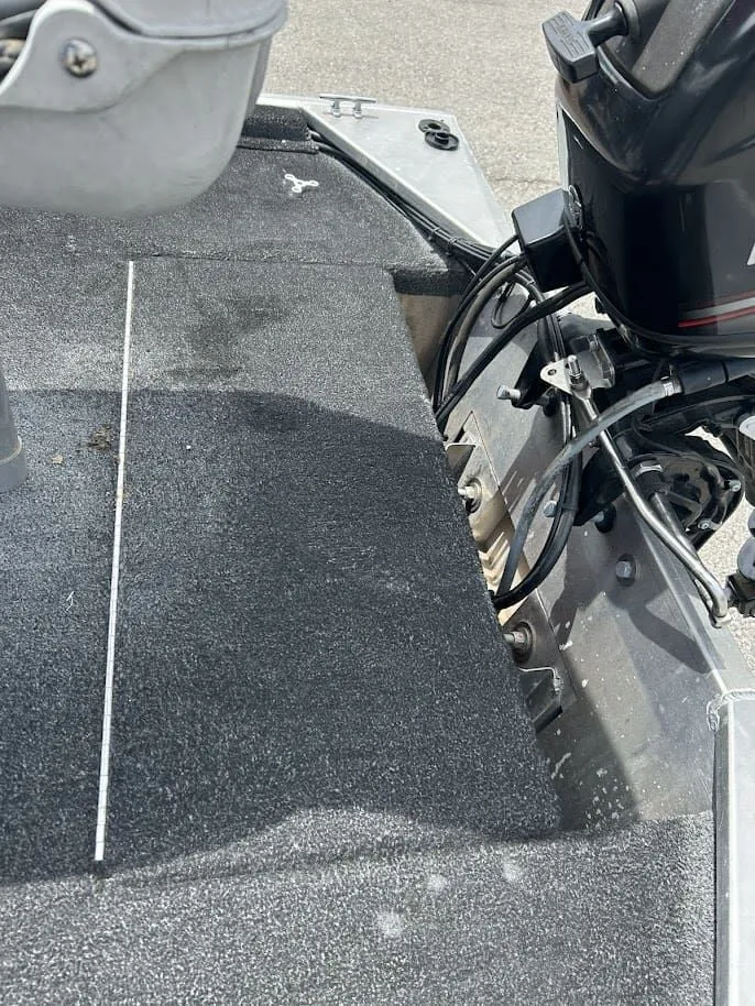 Slide: The Image of 2016 Tracker Pro 160 boat motor and deck view. - 17