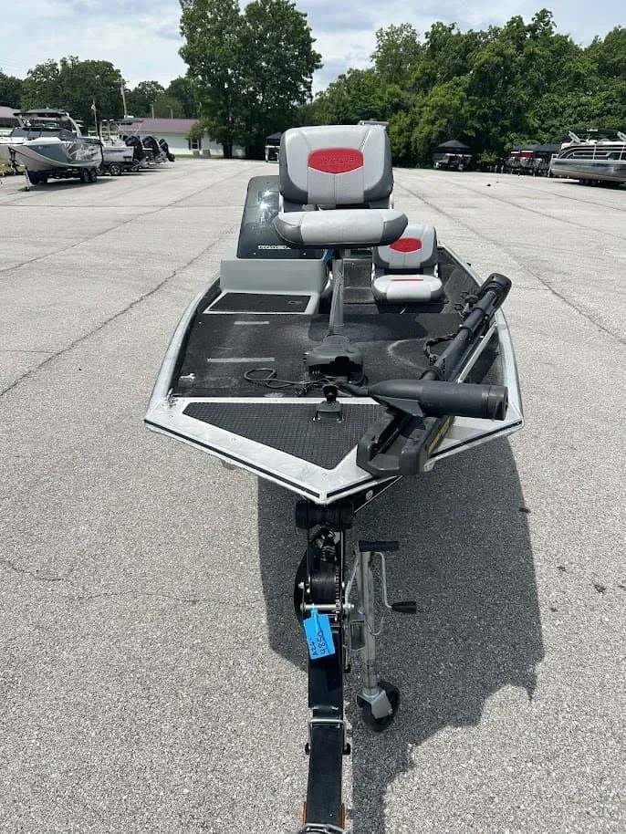 Slide: The Image of 2016 Tracker Pro 160 boat on a parking lot. - 6