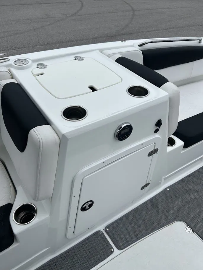 Slide: The Image of Interior of a 2019 Tahoe 2150 boat with seating and storage. - 11