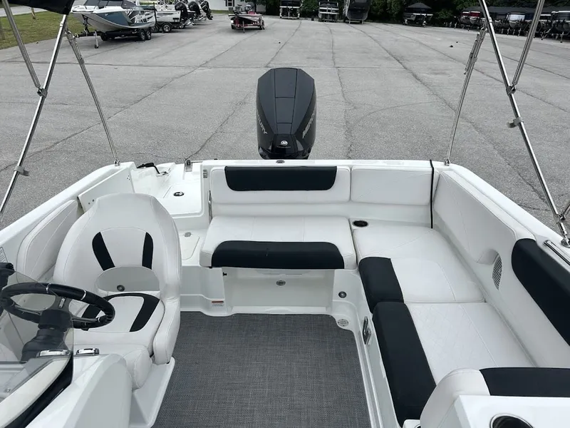 Slide: The Image of Interior view of a 2019 Tahoe 2150 boat with seating area. - 14