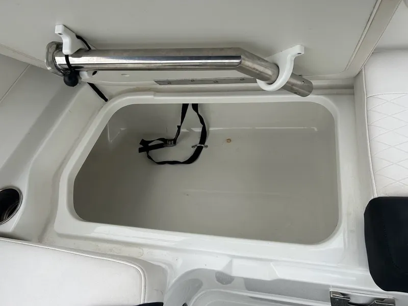 Slide: The Image of Storage compartment in 2019 Tahoe 2150 boat with grab handle. - 17