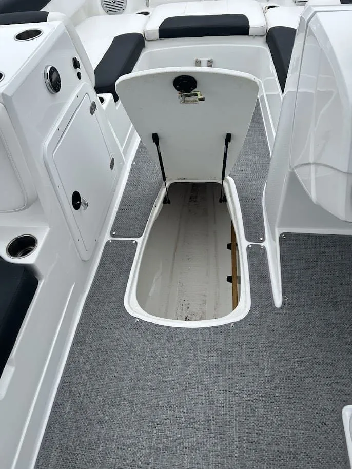 Slide: The Image of Open storage compartment in 2019 Tahoe 2150 boat. - 19