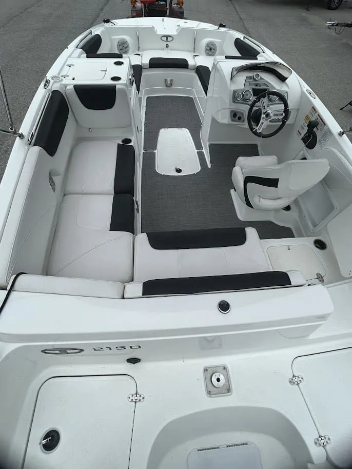 Slide: The Image of Interior view of a 2019 Tahoe 2150 boat with white seating. - 20