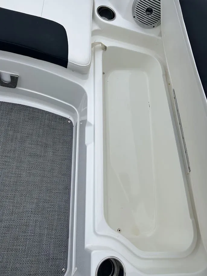 Slide: The Image of Interior of a 2019 Tahoe 2150 boat with seat and speaker. - 9