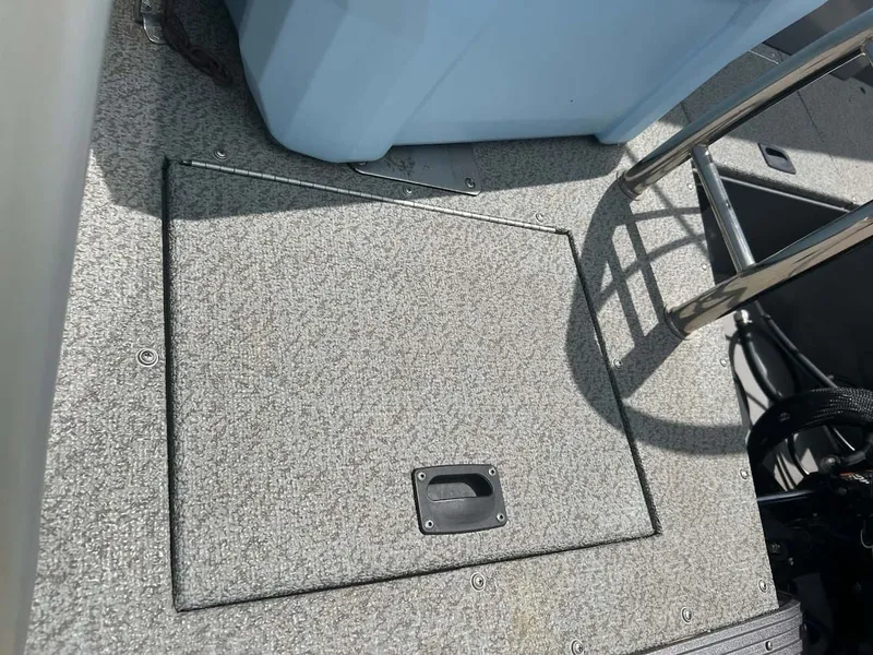 Slide: The Image of Lowe Sport Deck 224 boat deck with storage hatch, year 2018. - 16