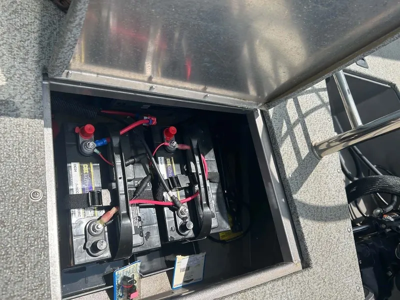 Slide: The Image of Battery compartment of 2018 Lowe Sport Deck 224 boat. - 17