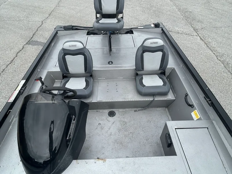 Slide: The Image of Interior view of a 2020 Stinger 175C boat with gray seats. - 12