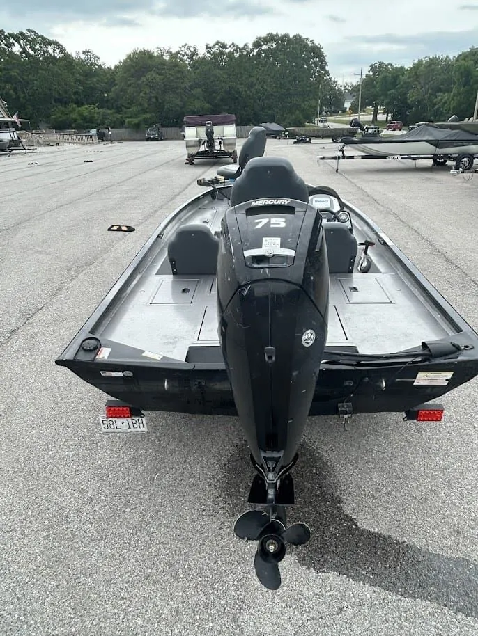 Slide: The Image of 2020 Stinger 175C boat with Mercury 75 engine on parking lot. - 3
