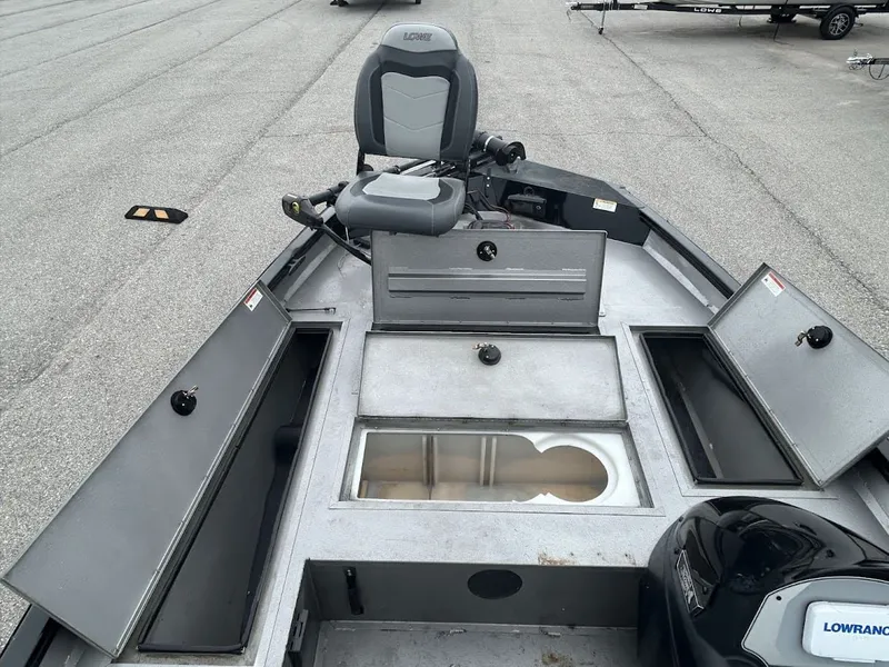 Slide: The Image of Interior view of a 2020 Stinger 175C boat with storage compartments. - 9