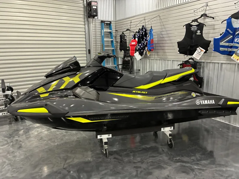 Slide: The Image of 2022 Yamaha VX Deluxe jet ski with audio in a showroom. - 4