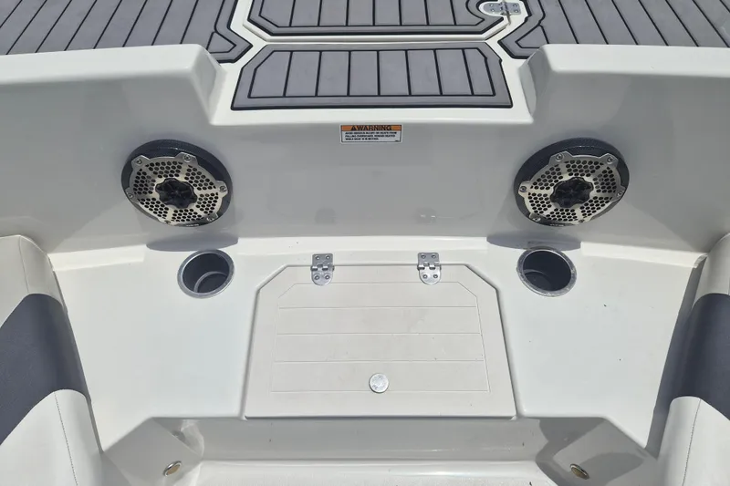 Slide: The Image of 2022 Starcraft SVX 171 OB boat interior with speakers and cup holders. - 18
