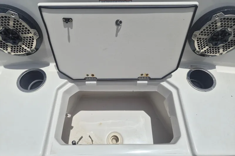 Slide: The Image of 2022 Starcraft SVX 171 OB boat interior with speakers and storage compartment. - 19