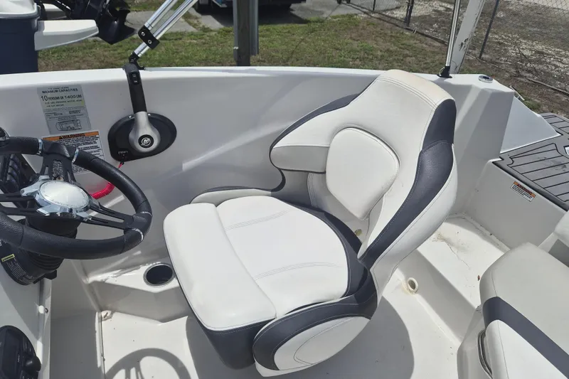 Slide: The Image of Captain's seat and steering wheel of 2022 Starcraft SVX 171 OB boat. - 8