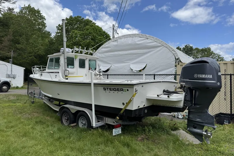 Slide: The Image of 2016 Steiger Craft 25 Chesapeake boat on trailer with Yamaha outboard motor. - 2