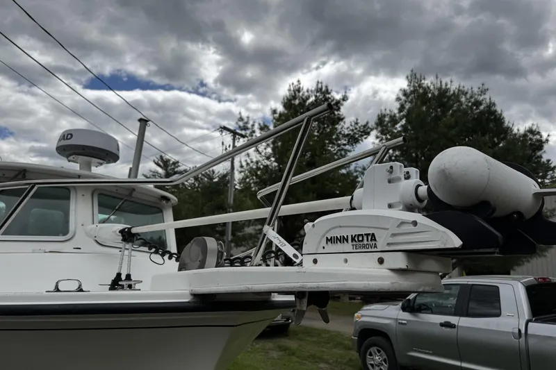 Slide: The Image of 2016 Steiger Craft 25 Chesapeake with Minn Kota Terrova motor under cloudy sky. - 6