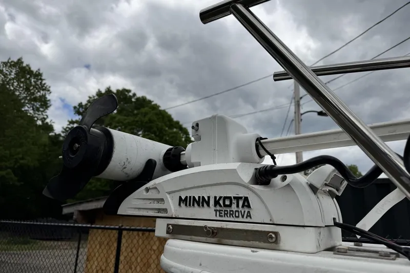 Slide: The Image of Minn Kota Terrova motor on 2016 Steiger Craft 25 Chesapeake boat under cloudy sky. - 8