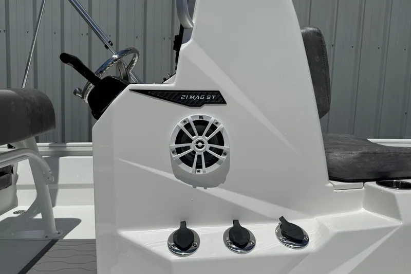 Slide: The Image of Avid 21 Mag 2026 boat console with speaker and controls, featuring sleek design. - 3