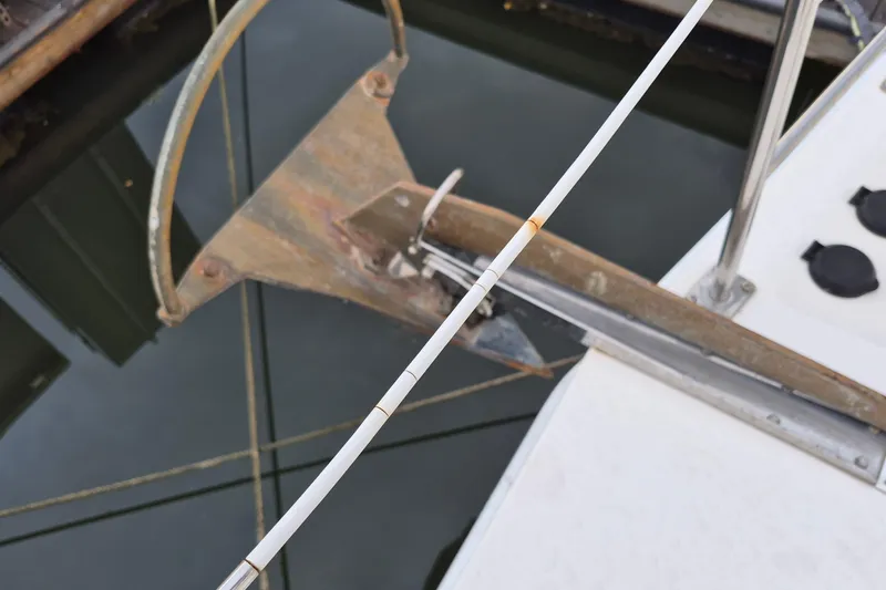 Slide: The Image of Anchor and bow of 2009 Endeavour 40 Skylounge yacht at dock. - 29