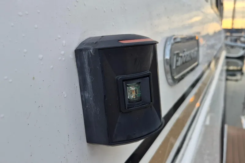 Slide: The Image of Close-up of a 2009 Endeavour 40 Skylounge boat exterior with a mounted device. - 33