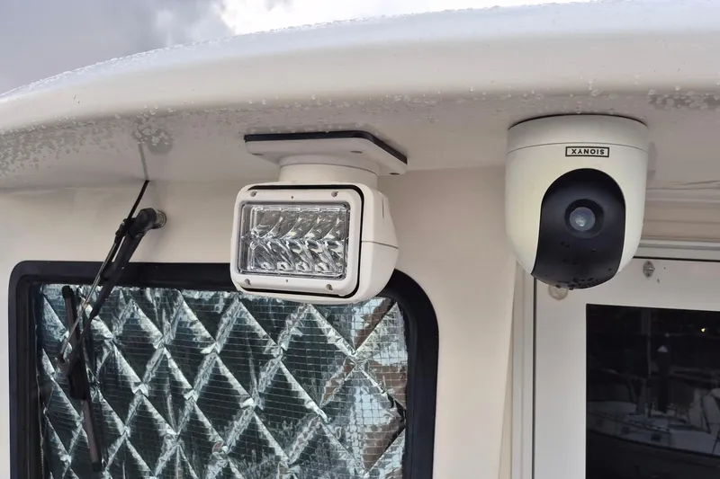 Slide: The Image of Security camera and light on 2009 Endeavour 40 Skylounge boat exterior. - 34