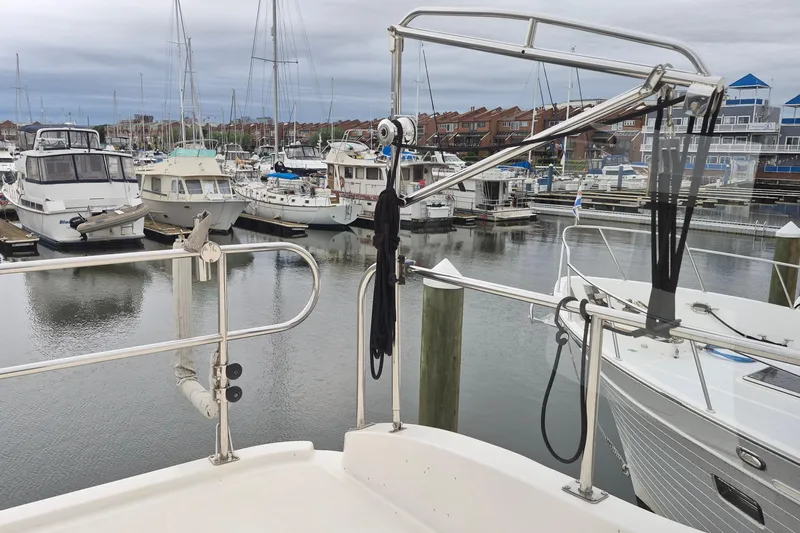 Slide: The Image of Marina view from 2009 Endeavour 40 Skylounge yacht, showcasing docked boats and calm waters. - 40