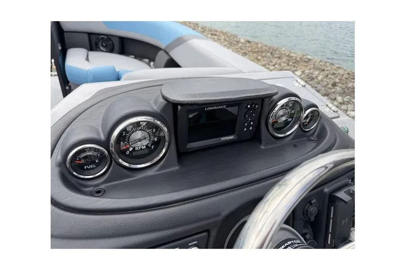 Slide: The Image of Dashboard of 2026 South Bay 224 RS 3.0 Hybrid Arch boat with gauges and controls. - 11