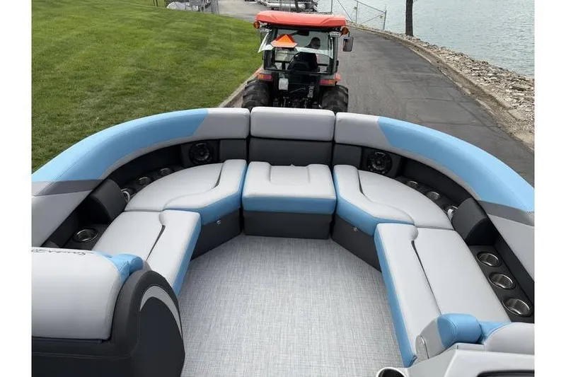 Slide: The Image of Luxurious seating on 2026 South Bay 224 RS 3.0 Hybrid Arch boat, near waterfront. - 16