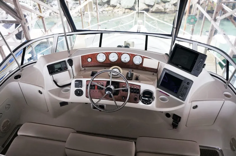 Slide: The Image of Cockpit of 2005 Silverton 39 Motor Yacht with controls and instruments. - 11