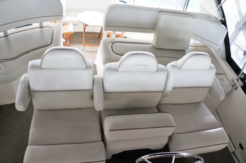 Slide: The Image of Interior of 2005 Silverton 39 Motor Yacht with white leather seating. - 14