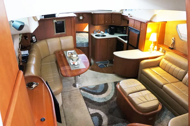 Slide: The Image of Interior of 2005 Silverton 39 Motor Yacht with leather sofas and kitchen. - 15