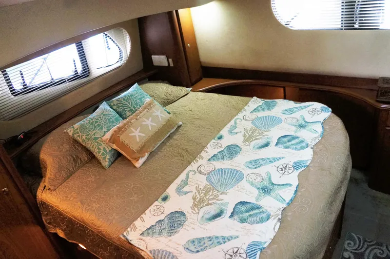 Slide: The Image of Interior of 2005 Silverton 39 Motor Yacht with cozy bedroom. - 21