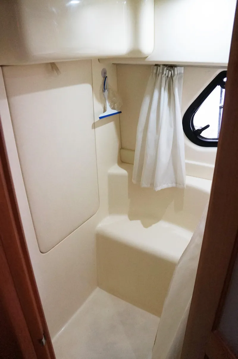 Slide: The Image of Interior of 2005 Silverton 39 Motor Yacht, bathroom with shower. - 25
