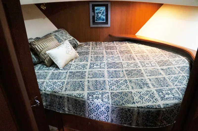 Slide: The Image of Interior of 2005 Silverton 39 Motor Yacht with cozy bed. - 26