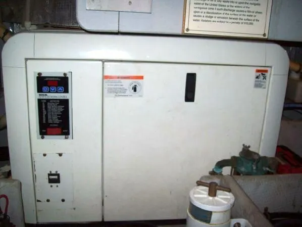 Slide: The Image of Generator compartment of a 2005 Silverton 39 Motor Yacht. - 31