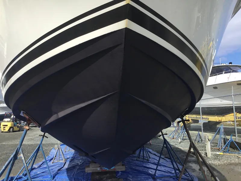 Slide: The Image of Bow view of a 2005 Silverton 39 Motor Yacht on stands. - 40