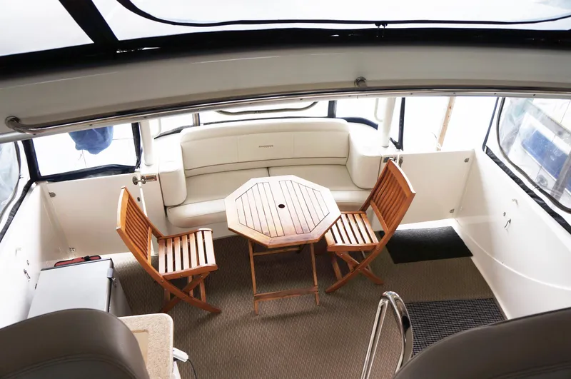 Slide: The Image of Interior of a 2005 Silverton 39 Motor Yacht with wooden furniture. - 9