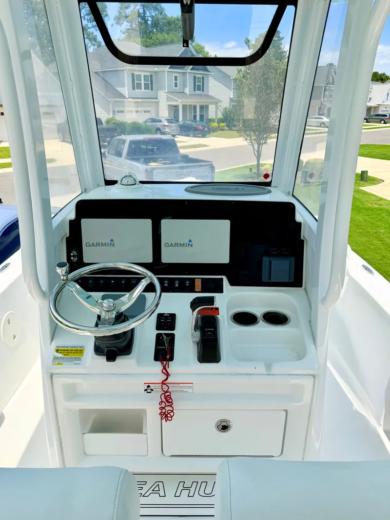 Slide: The Image of Interior view of 2019 Sea Hunt BX 25 FS with Garmin displays. - 12