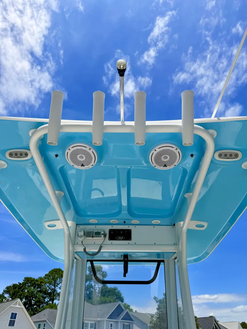Slide: The Image of 2019 Sea Hunt BX 25 FS boat roof with speakers and blue sky. - 15