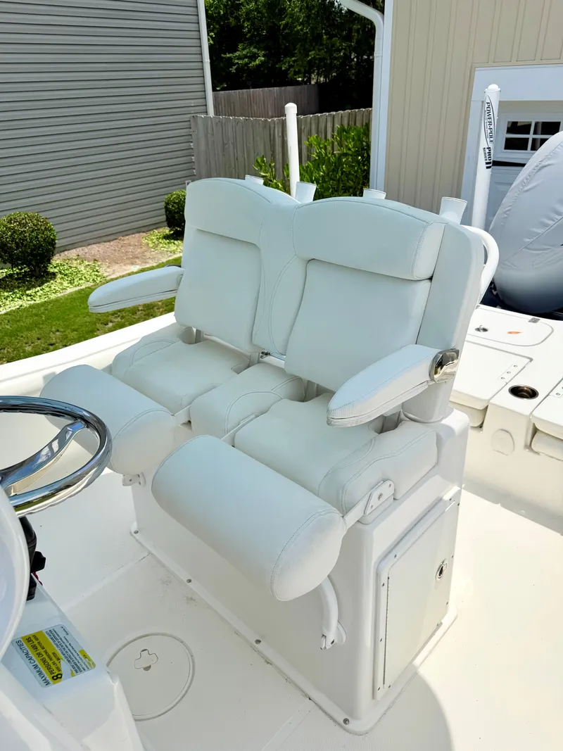 Slide: The Image of 2019 Sea Hunt BX 25 FS boat seats, white upholstery. - 17