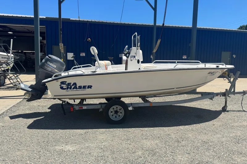 The Image of 2005 Sea Chaser 175 RG boat on trailer with Yamaha outboard motor. - 1