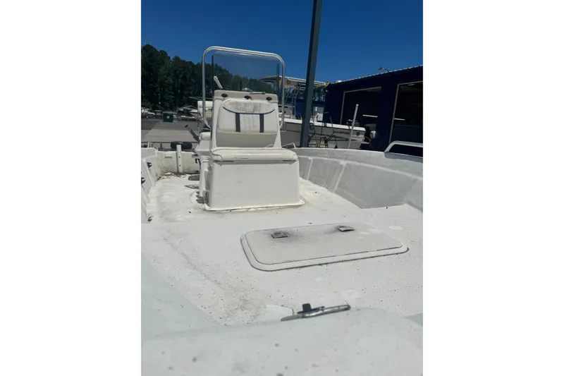 Slide: The Image of 2005 Sea Chaser 175 RG boat interior with seating and storage compartments. - 11