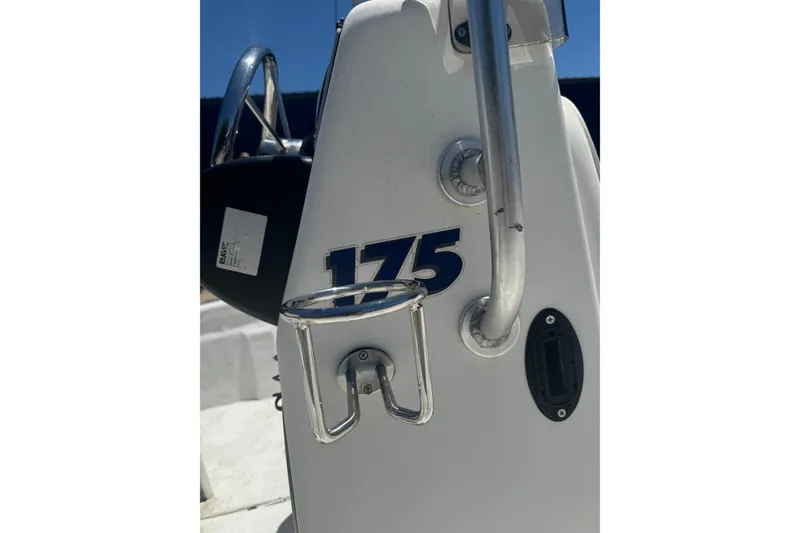 Slide: The Image of Close-up of 2005 Sea Chaser 175 RG boat console with cup holder. - 12