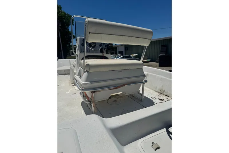 Slide: The Image of 2005 Sea Chaser 175 RG boat interior with seating and steering console. - 3