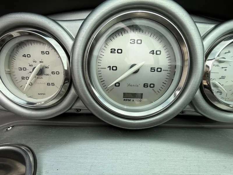 Slide: The Image of Tachometer and RPM gauge of a 2006 Azure AZ240. - 14