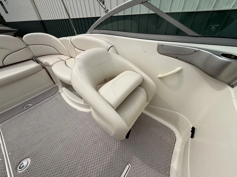 Slide: The Image of Interior of a 2006 Azure AZ240 boat with beige leather seating. - 21