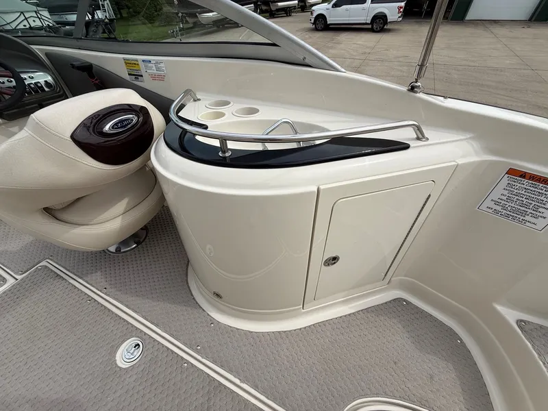 Slide: The Image of Interior of a 2006 Azure AZ240 boat with seating and storage. - 25