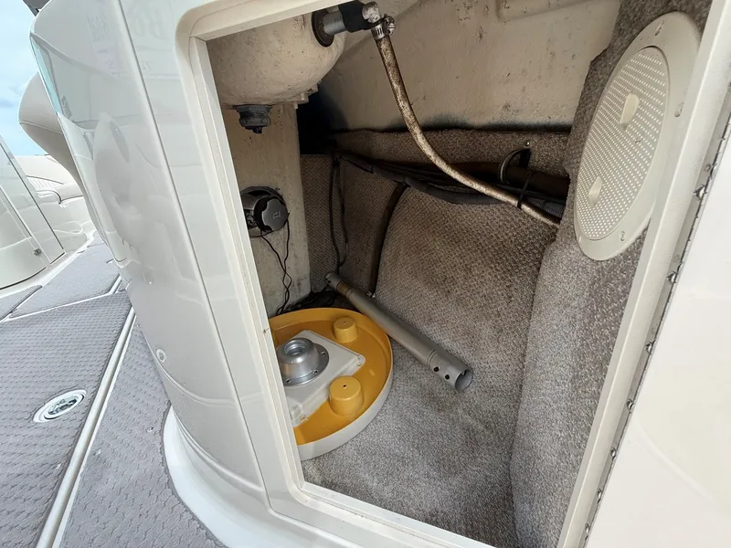 Slide: The Image of Interior of a 2006 Azure AZ240 boat showing technical components. - 26