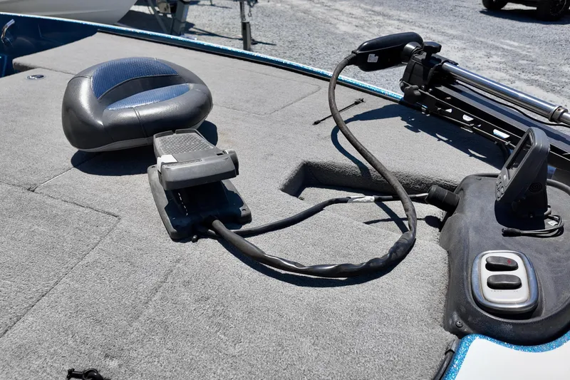 Slide: The Image of 2010 Nitro Z-7 boat deck with seat, foot pedal, and control panel. - 9
