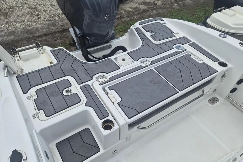 Slide: The Image of 2024 NauticStar 251 Hybrid boat deck with sleek design and modern features. - 7